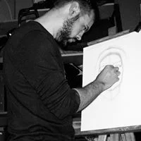 José Barrera dibujando un retrato